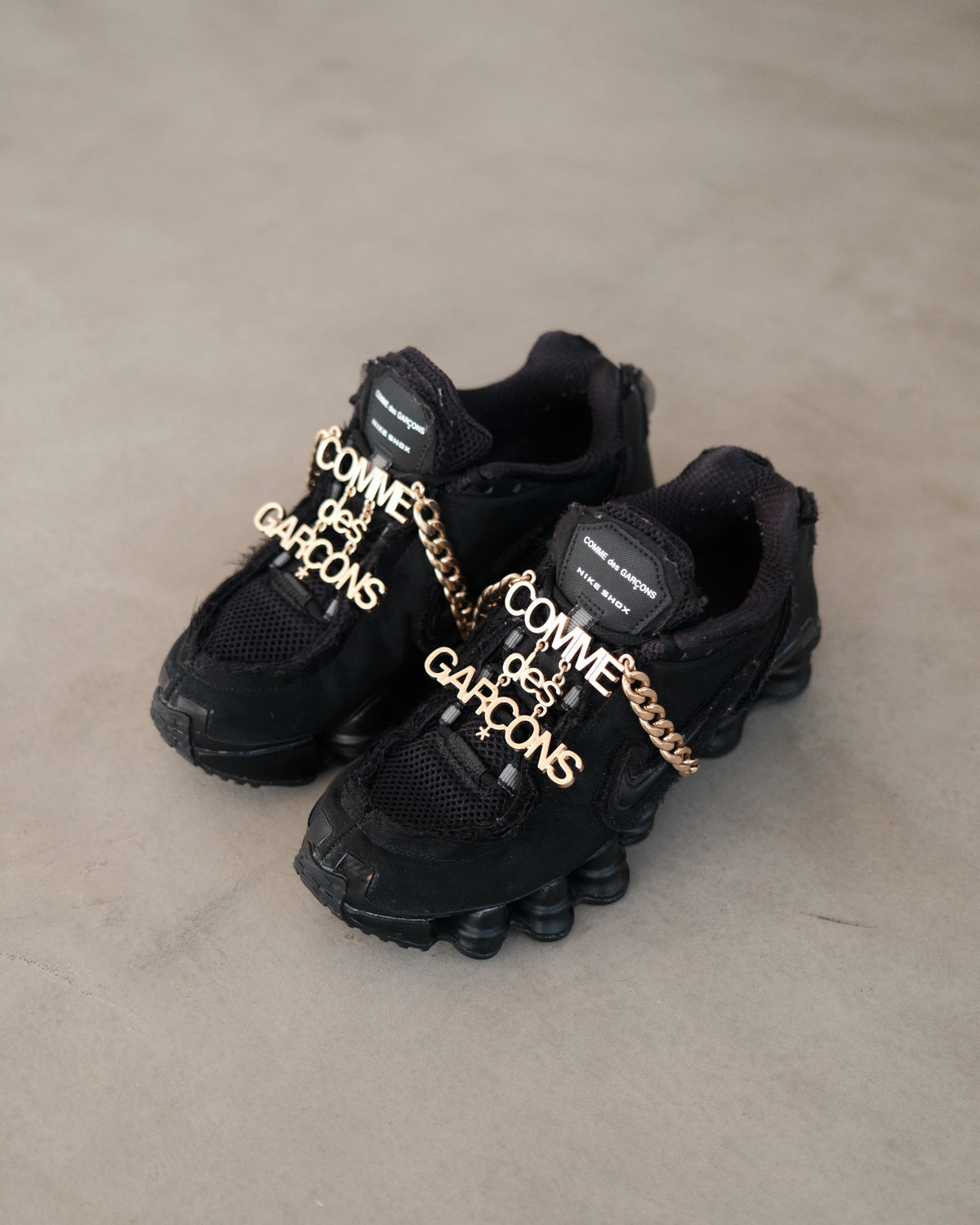 COMME des GARÇONS × Nike Shox TL in Triple Black Closer Look