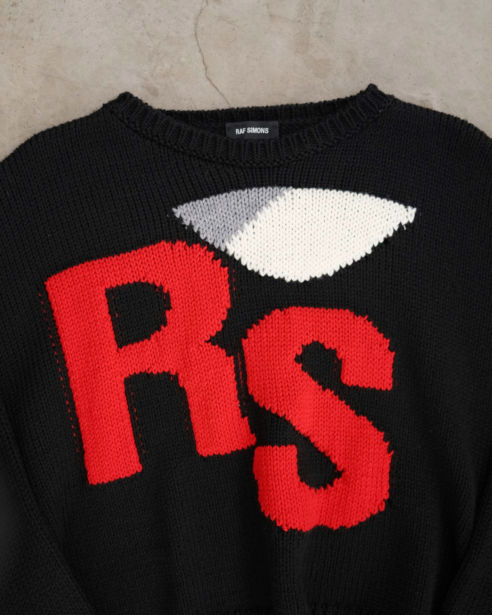 RAF SIMONS Virgin Wool Cropped
Oversized "RS" Sweater