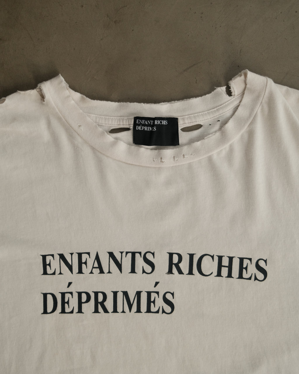 ENFANTS RICHES DÉPRIMÉS 
Distressed Logo-Print Cotton-Jersey T-Shirt