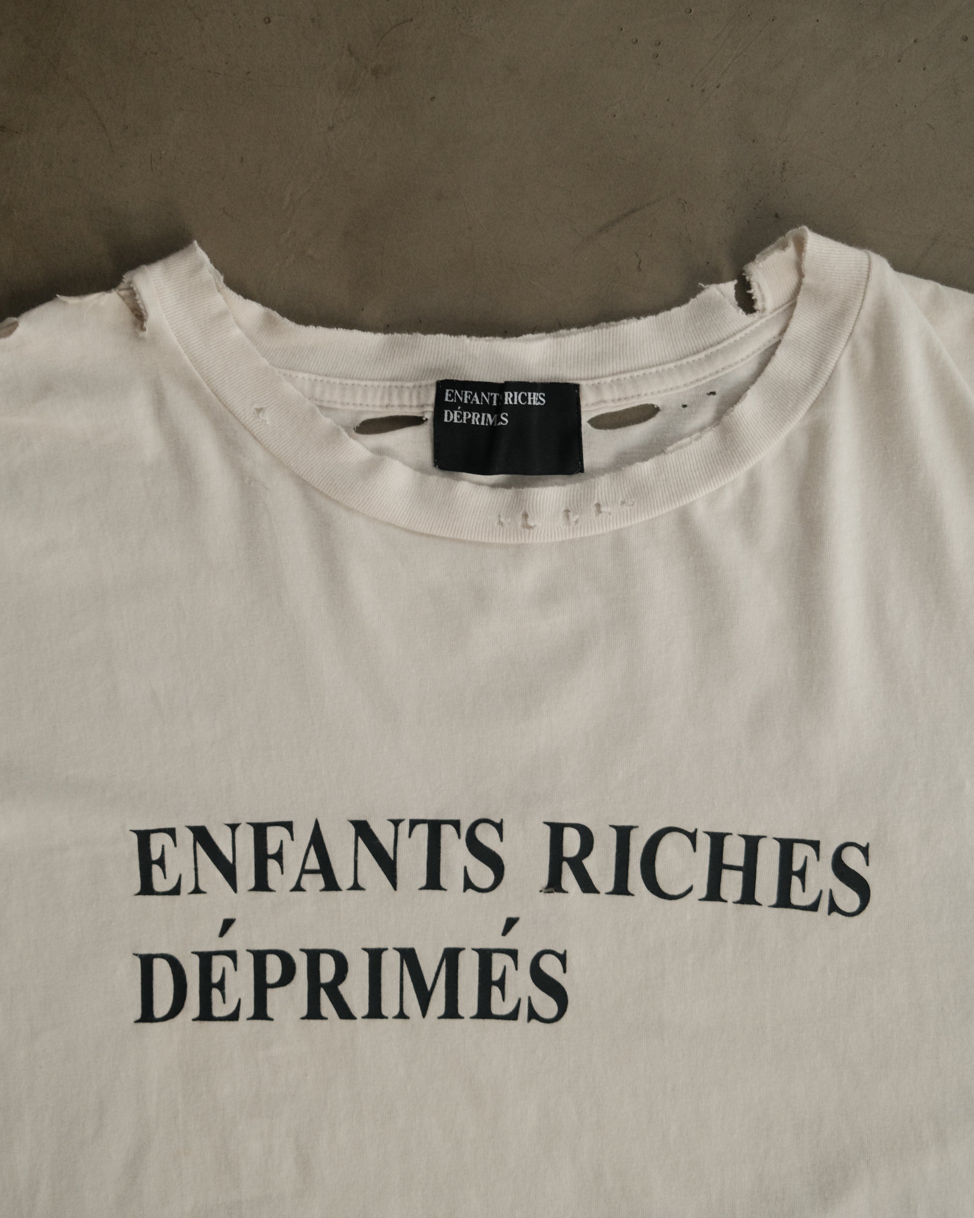 ENFANTS RICHES DÉPRIMÉS 
Distressed Logo-Print Cotton-Jersey T-Shirt