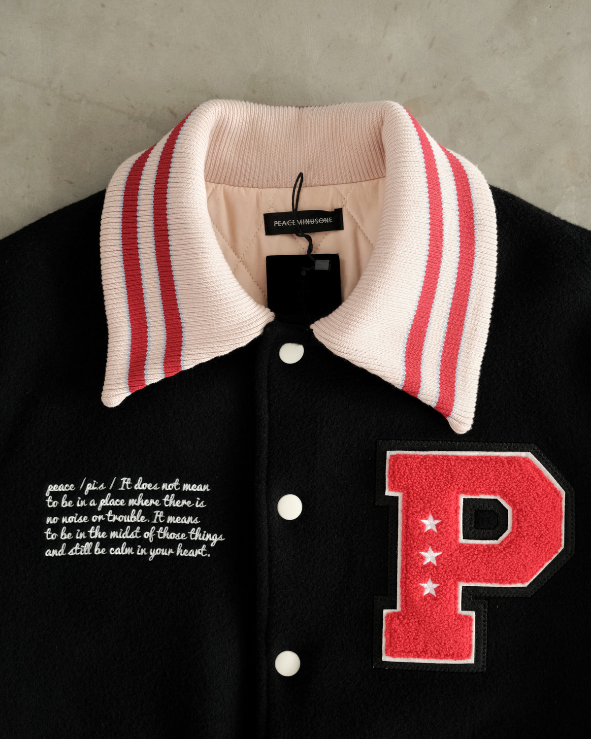 ss22 PEACEMINUSONE
Delivers Collared Varsity
Jackets