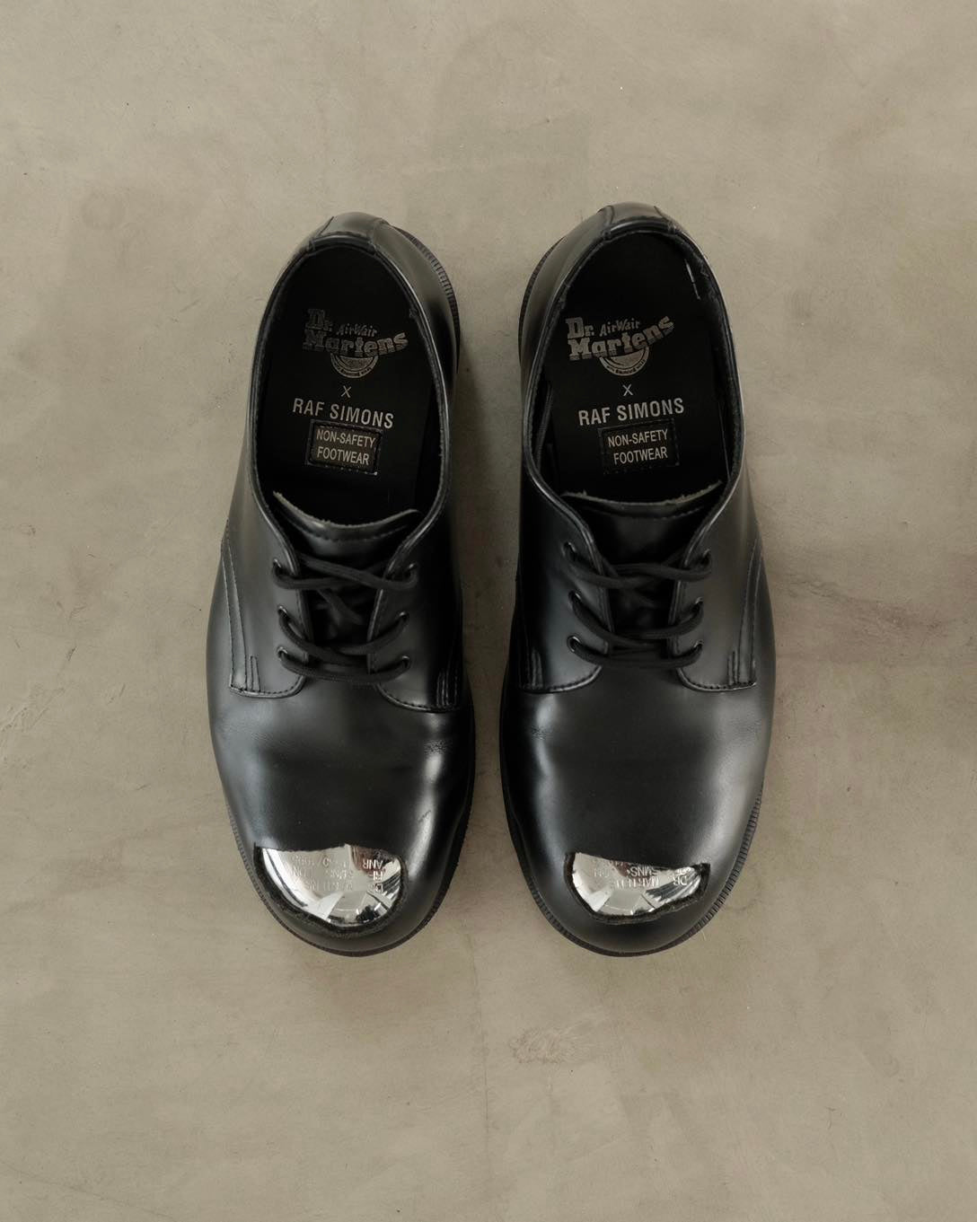 RAF SIMONSX D. MARTENS Cut Out Steel Toe Shoe
