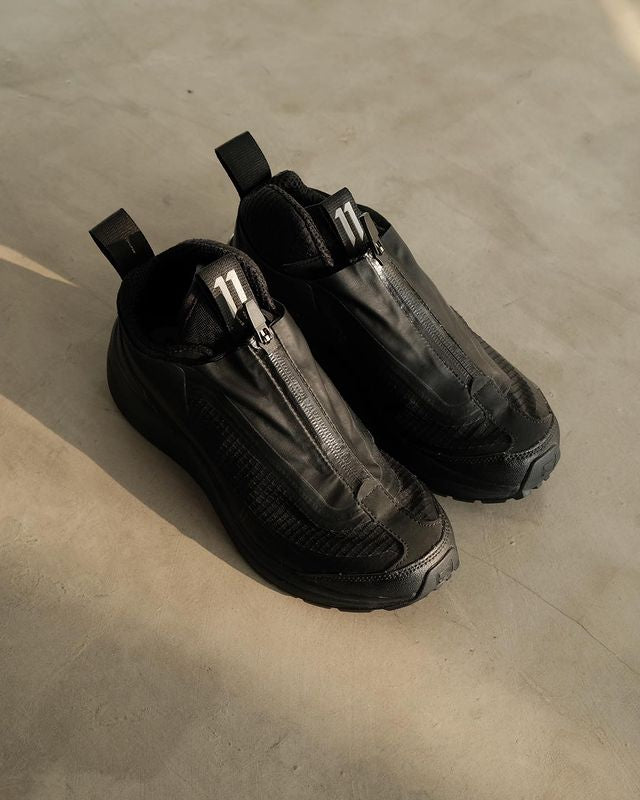 11 BY BORIS BIDJAN SABERI Black Salomon Bamba 2 Low Sneakers
