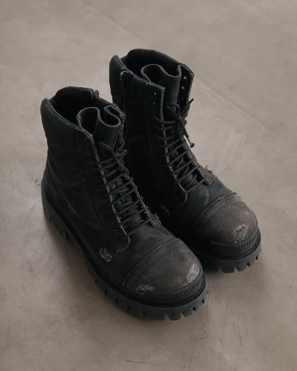 BALENCIAGA Strike Distressed Lace-Up Boots