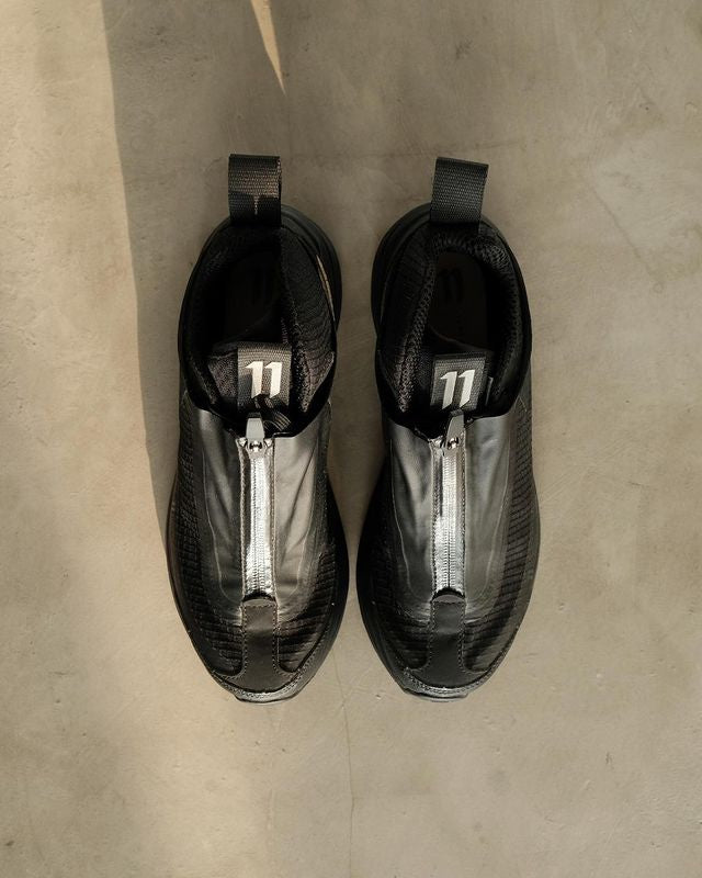 11 BY BORIS BIDJAN SABERI Black Salomon Bamba 2 Low Sneakers